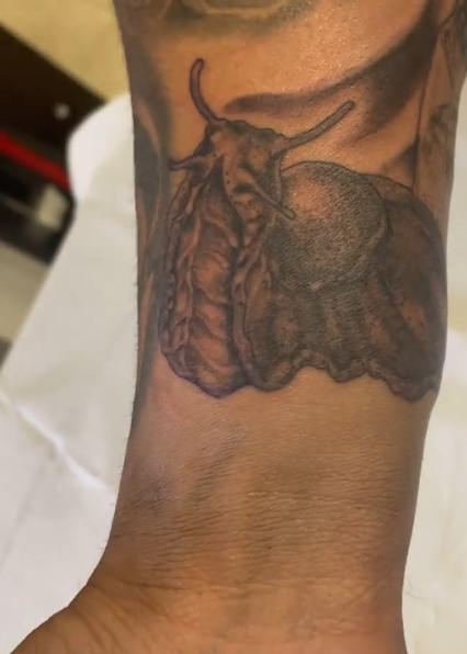 Brandon Bean - Snail Tattoo